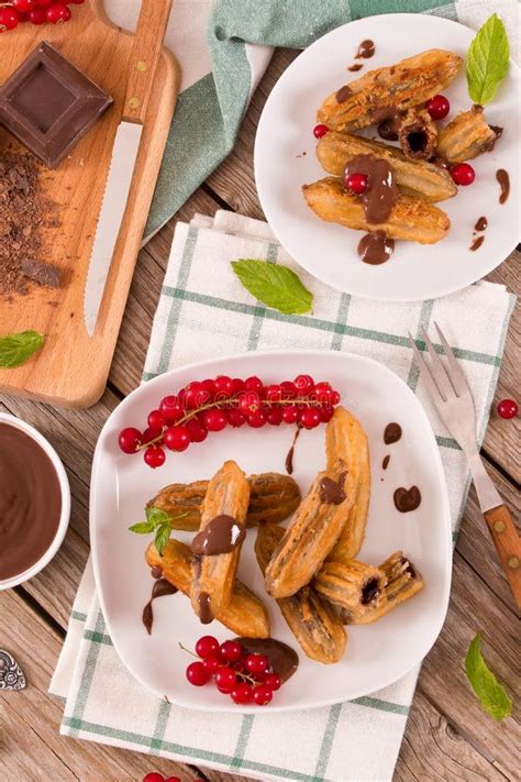 Mini Churros with Chocolate Dipping Sauce. Stock Image - Image of ...