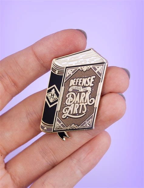 Defense against the dark arts book enamel pin – Joanna Behar