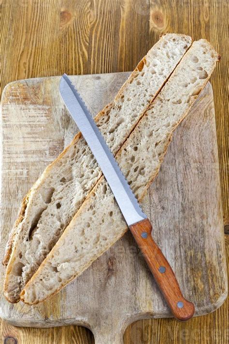 knife cutting cut dish bread  stock photo  vecteezy