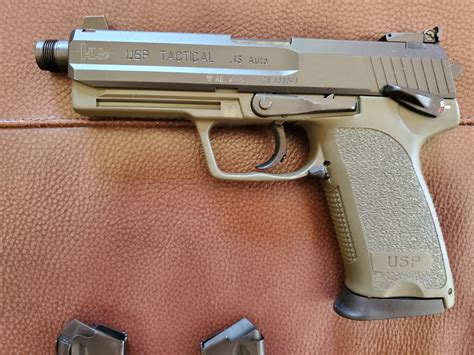 USP 45 Tactical in ODG near new....24 rounds count with original eagle ...