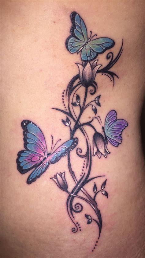 butterfly on stomach tattoo 4