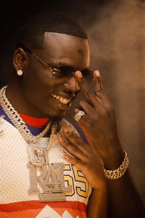 Download Big Boogie Making Hand Sign Wallpaper | Wallpapers.com