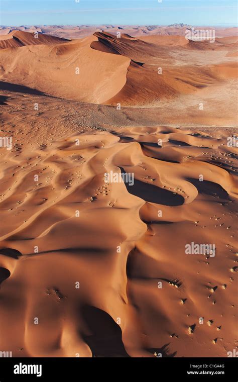 Aerial view of red sand dunes at Sossusvlei. Namib desert. Namib ...