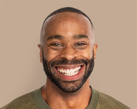 handsome man smiling happy face portrait close   photo