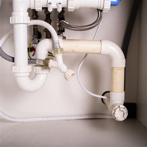 Below the Kitchen Sink: Dealing With Kitchen Drain Pipe Leaks - Water ...