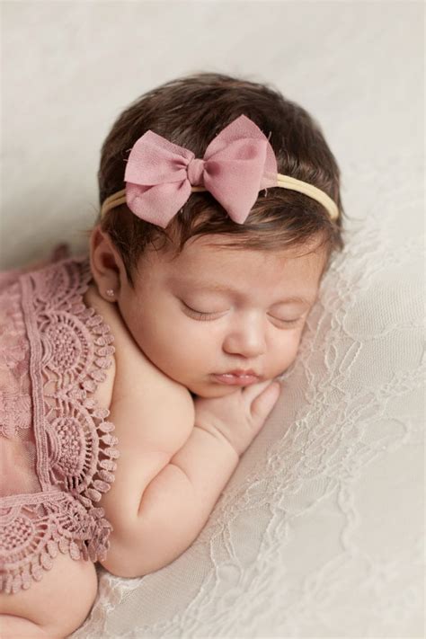 cute newborn baby girl  brown hair