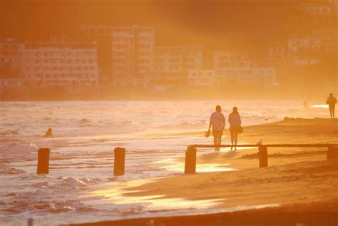 romantic couple on beach 12654493 Stock Photo at Vecteezy