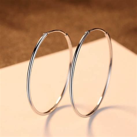 Сребърни обеци с уникален дизайн – Silenti Jewelry