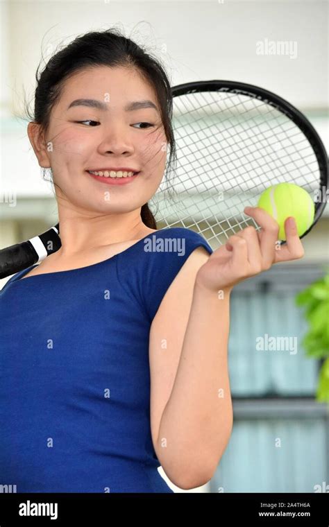 Athlete Chinese Female Basketball Player Smiling With Basketball Stock ...