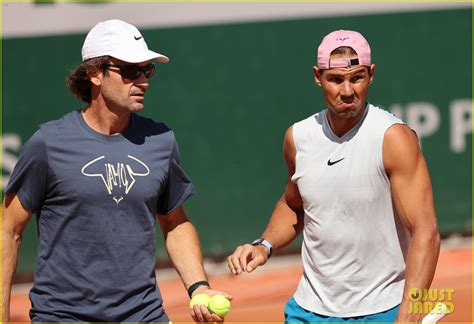 rafael nadal flaunts toned arms   tank top  practicing