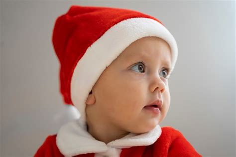 Premium Photo | Front view cute baby wearing santa hat