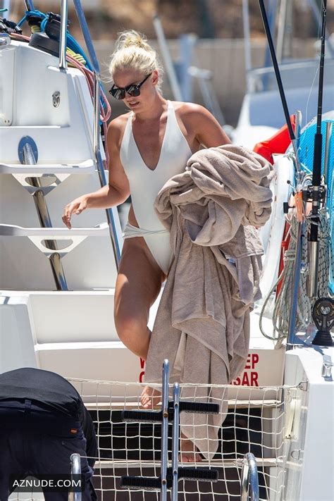 Lindsey Vonn in a while one-piece while vacationing with her fiance P.K