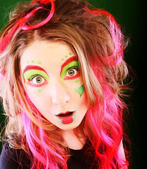 Premium Photo | Funny girl over green background