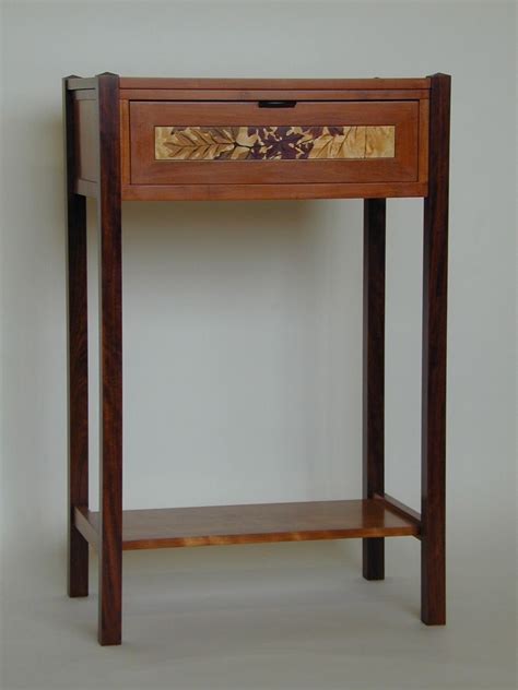 hand  fallen leaves table  paula garbarino custom furniture