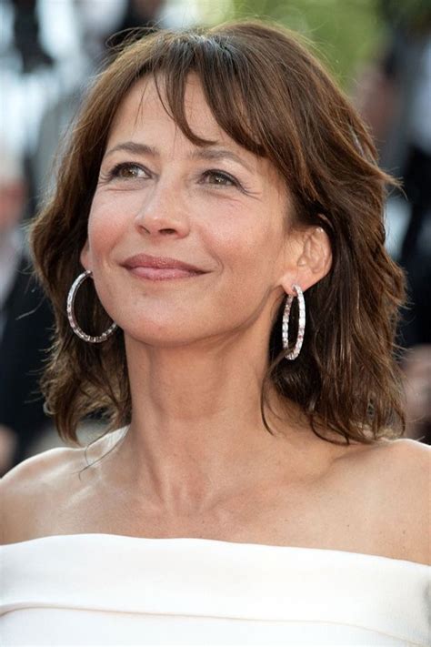 Cannes 2021 : Sophie Marceau, radieuse aux côtés de François Ozon et ...