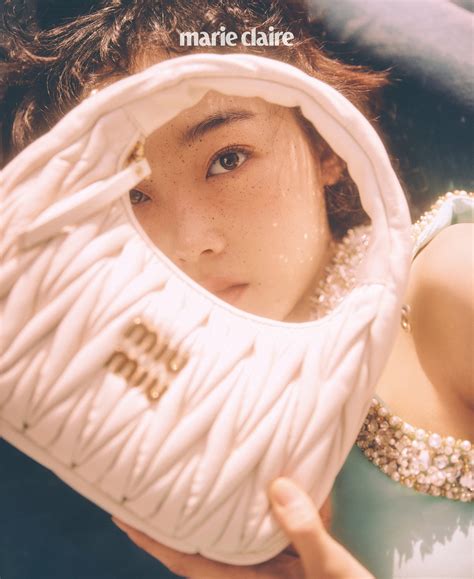 Miu Miu on Twitter: "You Mi Lee wearing #MiuMiuDayNight and #MiuWander