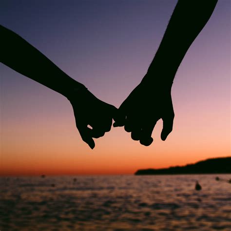Lovers Holding Hands Sunset