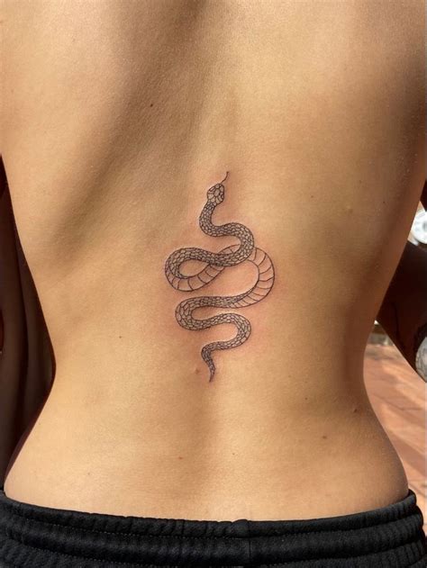 Snake back tattoo | Tattoos, Simplistic tattoos, Tattoos for women