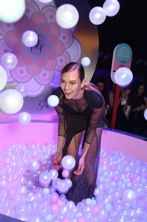 Karlie Kloss risked a major wardrobe malfunction at aptly named Naked