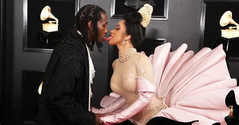 Cardi B & Offset Lick Tongues On The Grammys Red Carpet