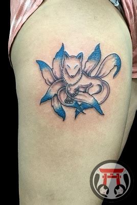thigh fox gate tattoo