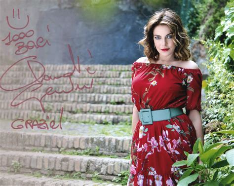 Claudia Gerini Signed Photograph - CharityStars
