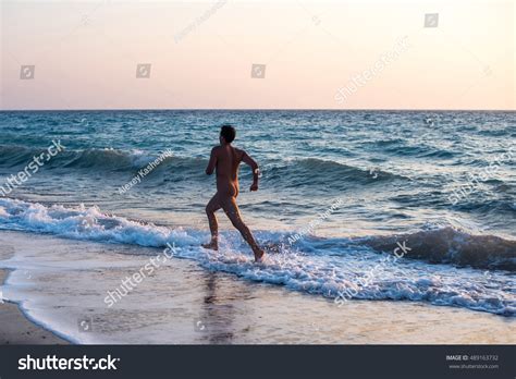 Naked Man Running On Beach Rhodes Stock Photo 489163732 | Shutterstock