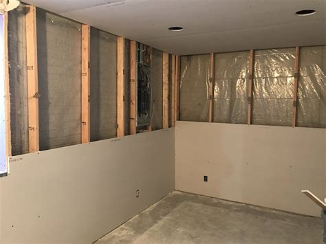 insulation - How can I deal with condensation on the vapor barrier in