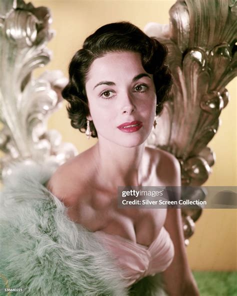 Dana Wynter , German-born British actress, wearing a pink sleeveless