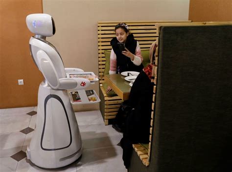 McDonald's is replacing staff with robots at select restaurants