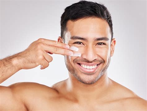 premium photo face portrait  asian man  lotion  studio