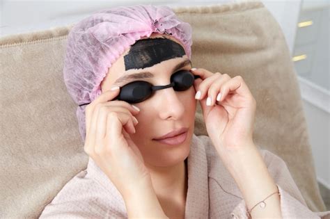 Premium Photo | Woman getting carbon peeling in beauty salon