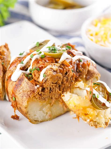 Pulled Pork Stuffed Baked Potatoes - Cooking With Carlee