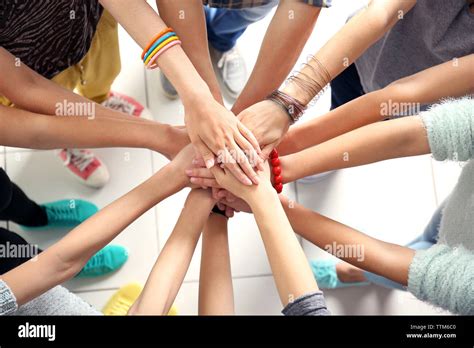 Many friends hands Stock Photo - Alamy