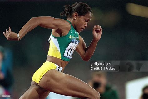summer olympics australia cathy freeman  action winning