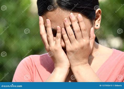 A Shameful Female Woman stock image. Image of embarrassed - 137592615