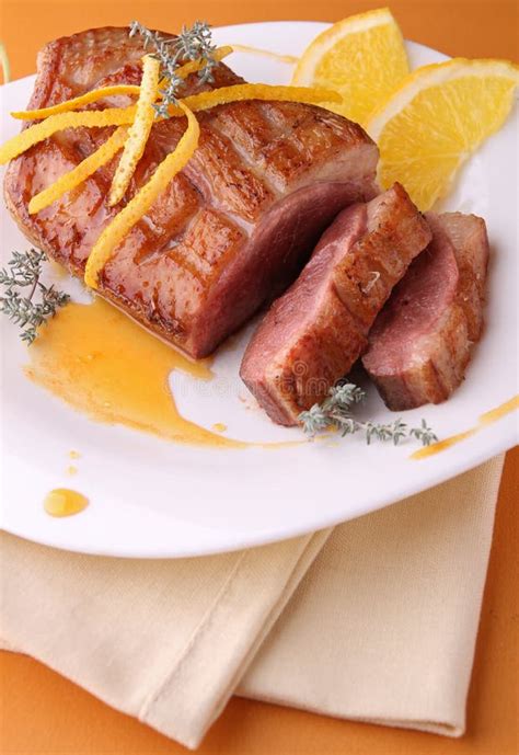 Roasted Duck Breast with Orange Sauce Stock Photo - Image of gastronomy