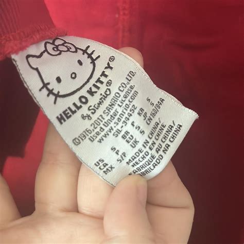 Hello Kitty sanrio forever 21 red pinafore... - Depop