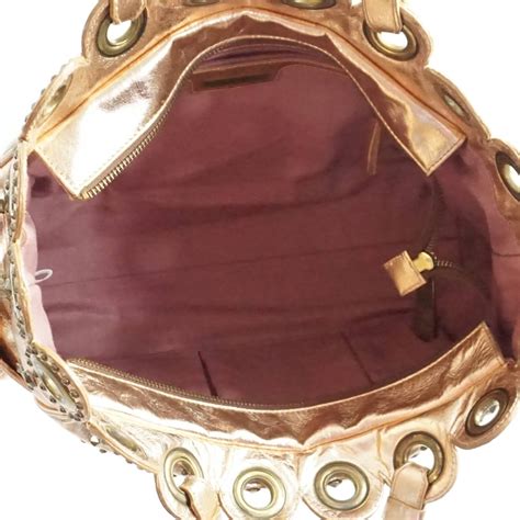 Isabella Fiore Rose Gold Leather Bag with Grommets For Sale at 1stDibs