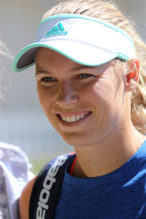 Riveting caroline wozniacki images capturing her fierce spirit