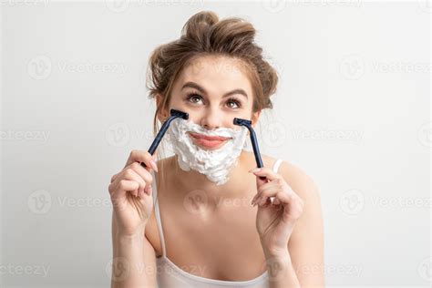 Woman shaving face with razor 22429431 Stock Photo at Vecteezy