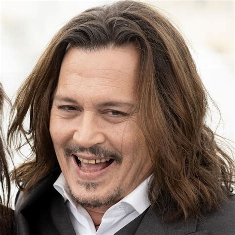 Johnny Depp's Teeth: The Real Reason He Almost Never Smiles