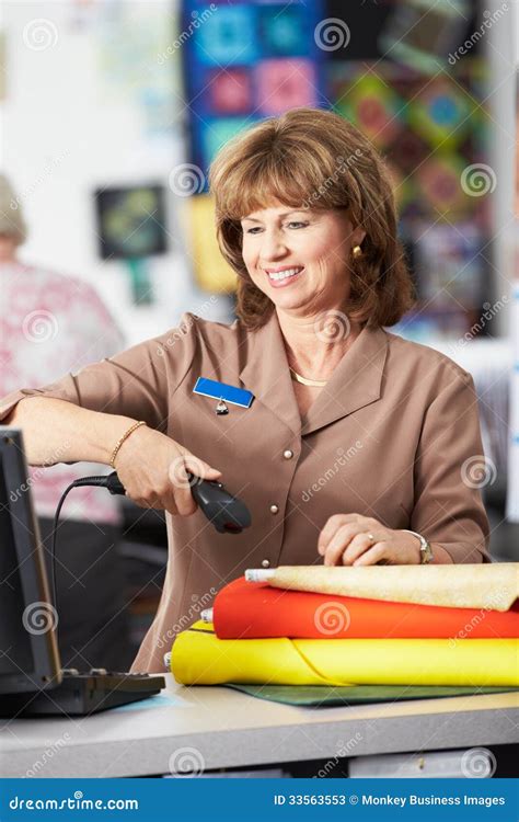 Female Cashier At Supermarket Checkout Royalty-Free Stock Photography ...