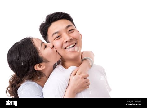 Kiss On the Cheek. Woman kissing man on cheek Stock Photo - Alamy