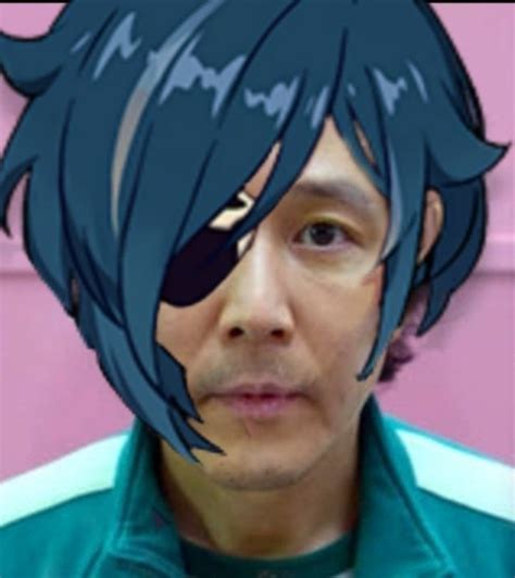 a man with blue hair is looking at the camera