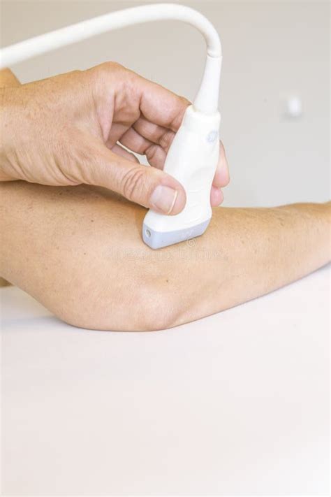 Ultrasound Treatment on Elbow Stock Photo - Image of medical, female: 45599718