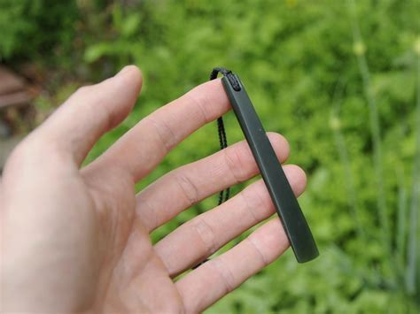 Dark Pounamu Drop — A Carved Piece