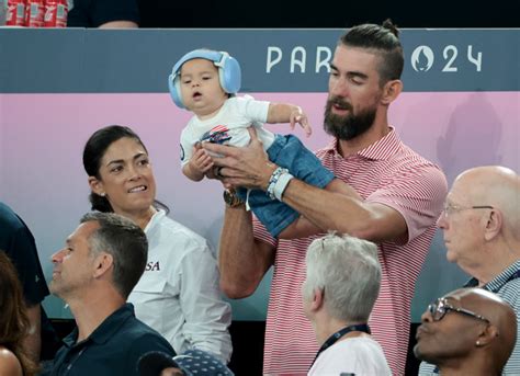 PARIS, FRANCE - JULY 30: Michael Phelps and his baby Nico Phelps attend