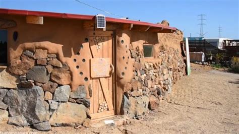 Couple Builds Island Off-Grid Village With Friends And Leftovers