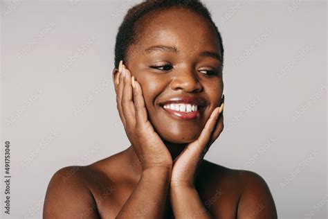 African american woman face looking away toothy smiling isolated over ...